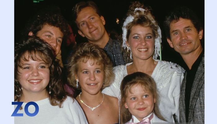  Kirk Cameron, partially obscured by his sister Bridgette Cameron, alongside his sister Melissa Cameron, youngest sister American actress Candace Cameron, mother Barbara Cameron, and father Robert Cameron